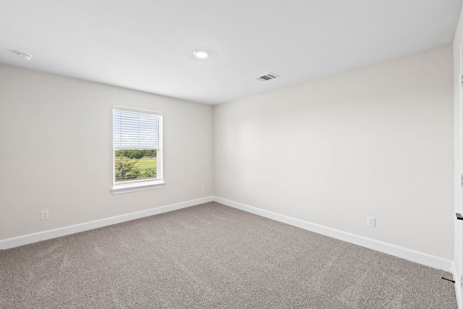 The secondary bedrooms of the Cypress floor plan are a great space for childrens bedrooms or as guest rooms.