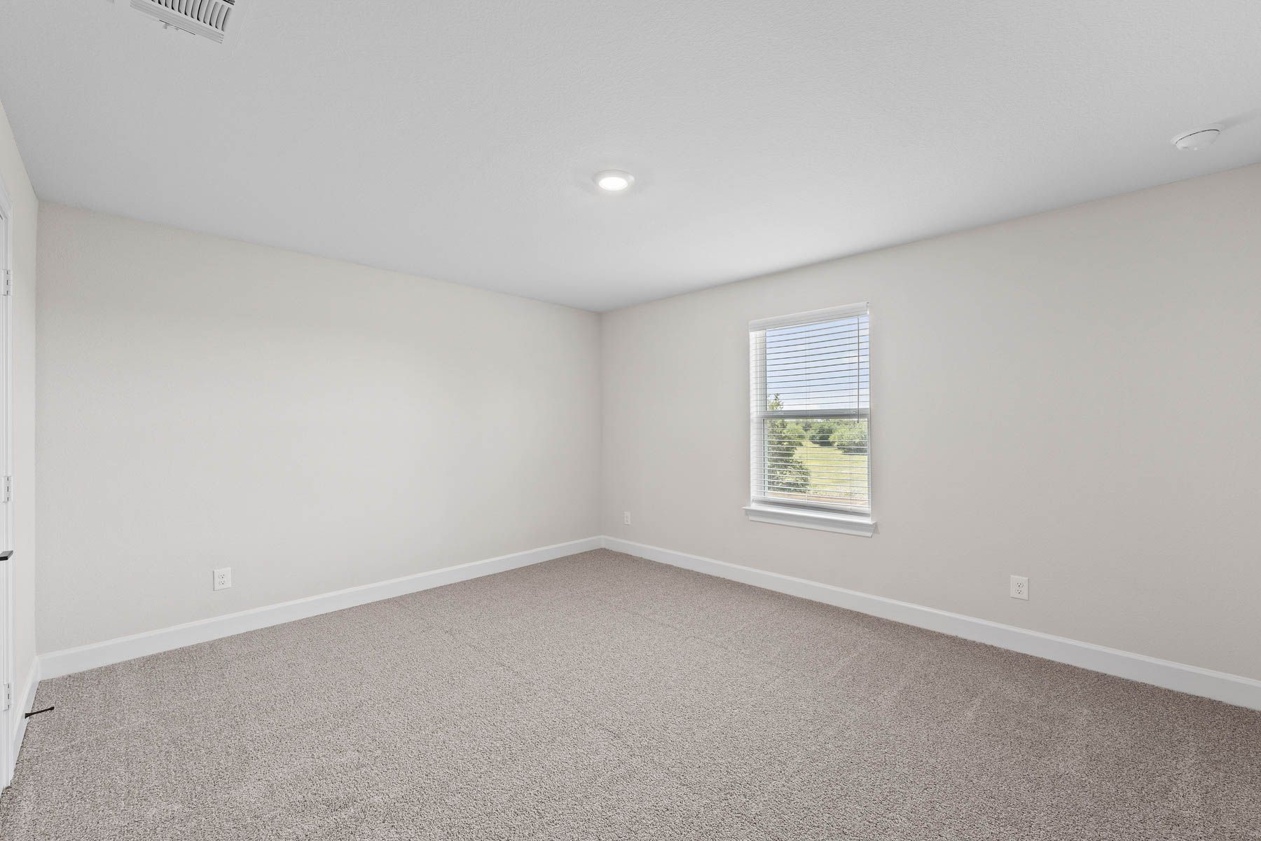 The secondary bedrooms of the Cypress floor plan are a great space for childrens bedrooms or as guest rooms.