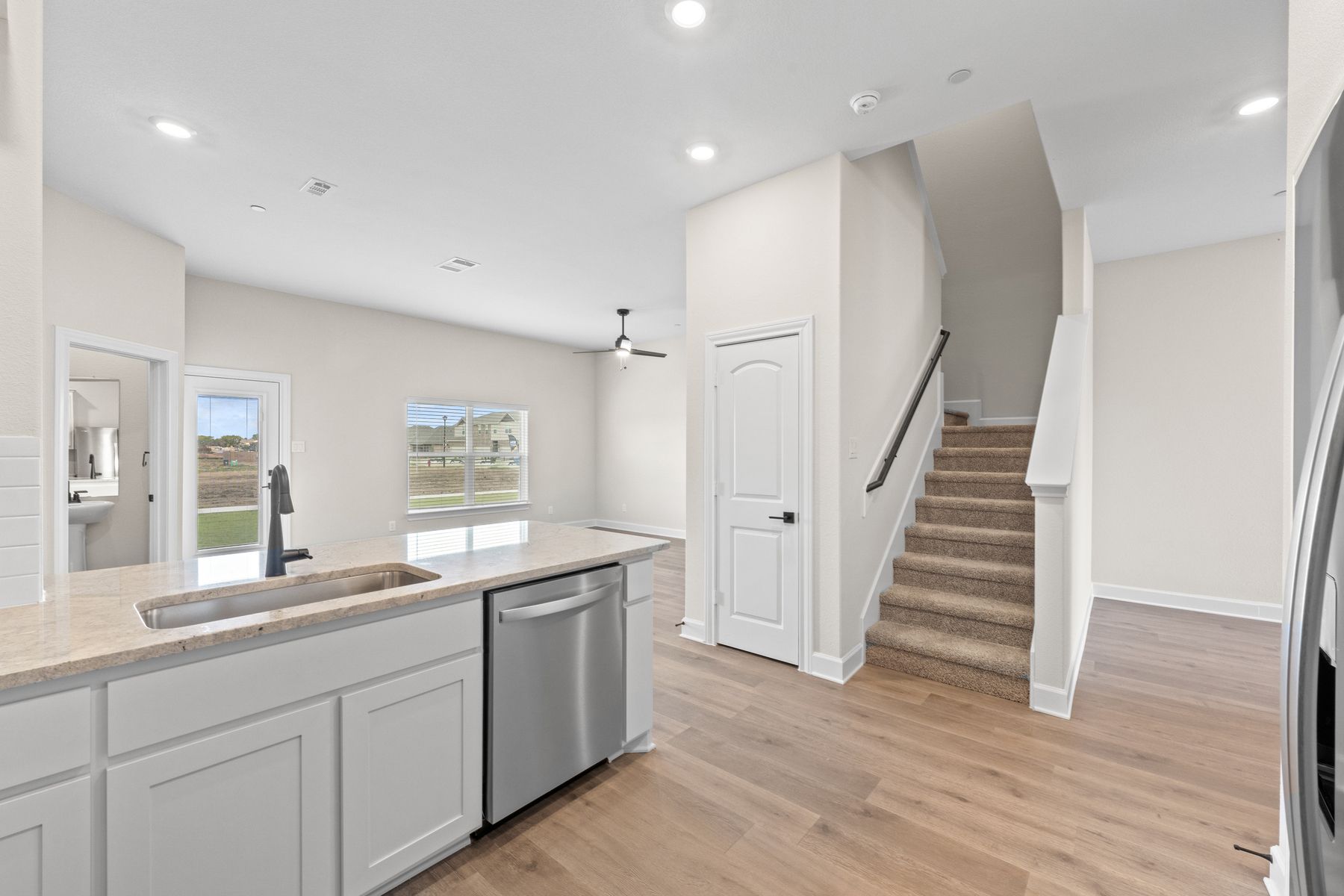 The open concept layout of the Appaloosa connects the kitchen with the dining area and family room.