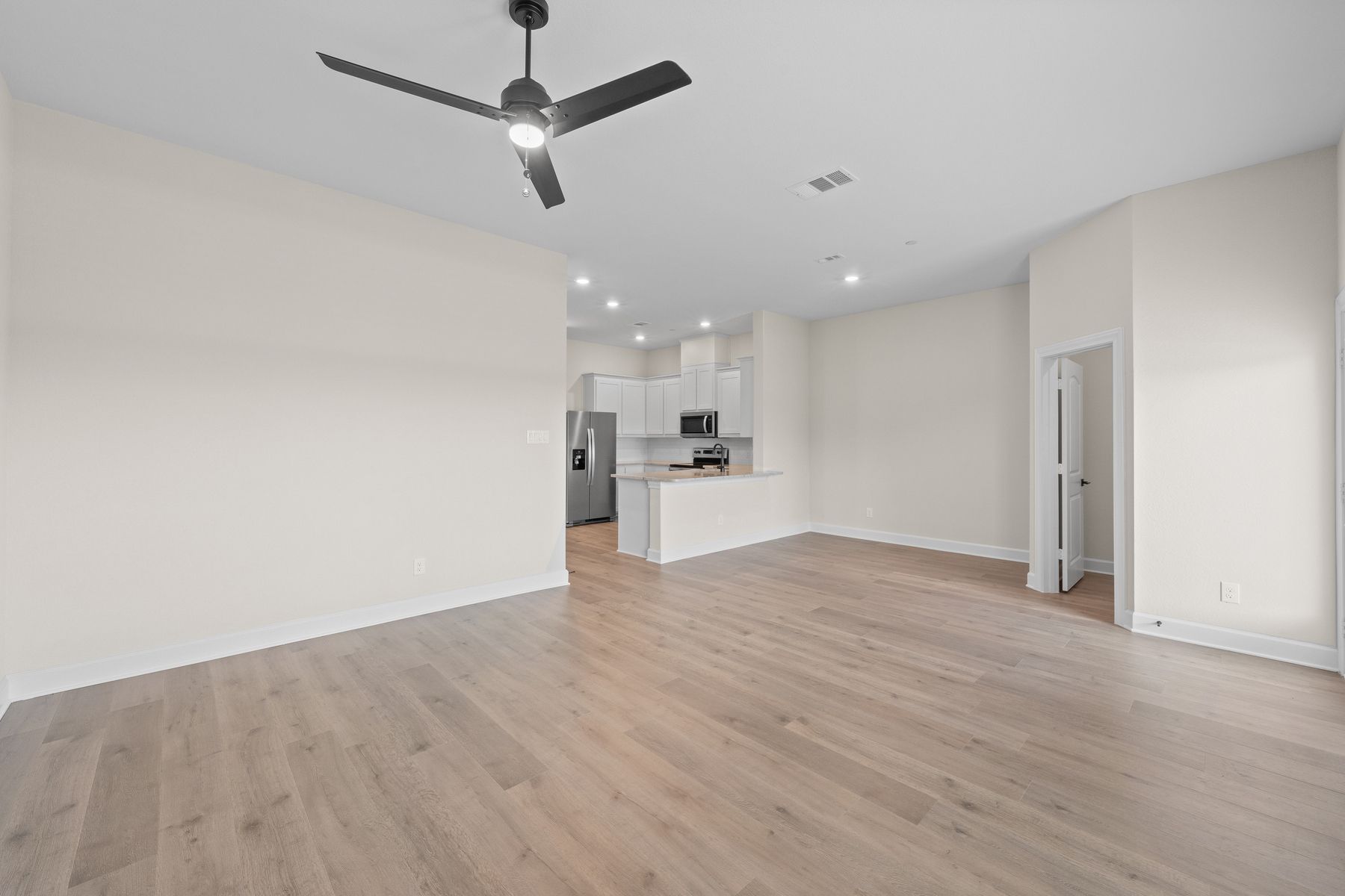 The open concept layout of the Appaloosa connects the family room with the dining area and kitchen.