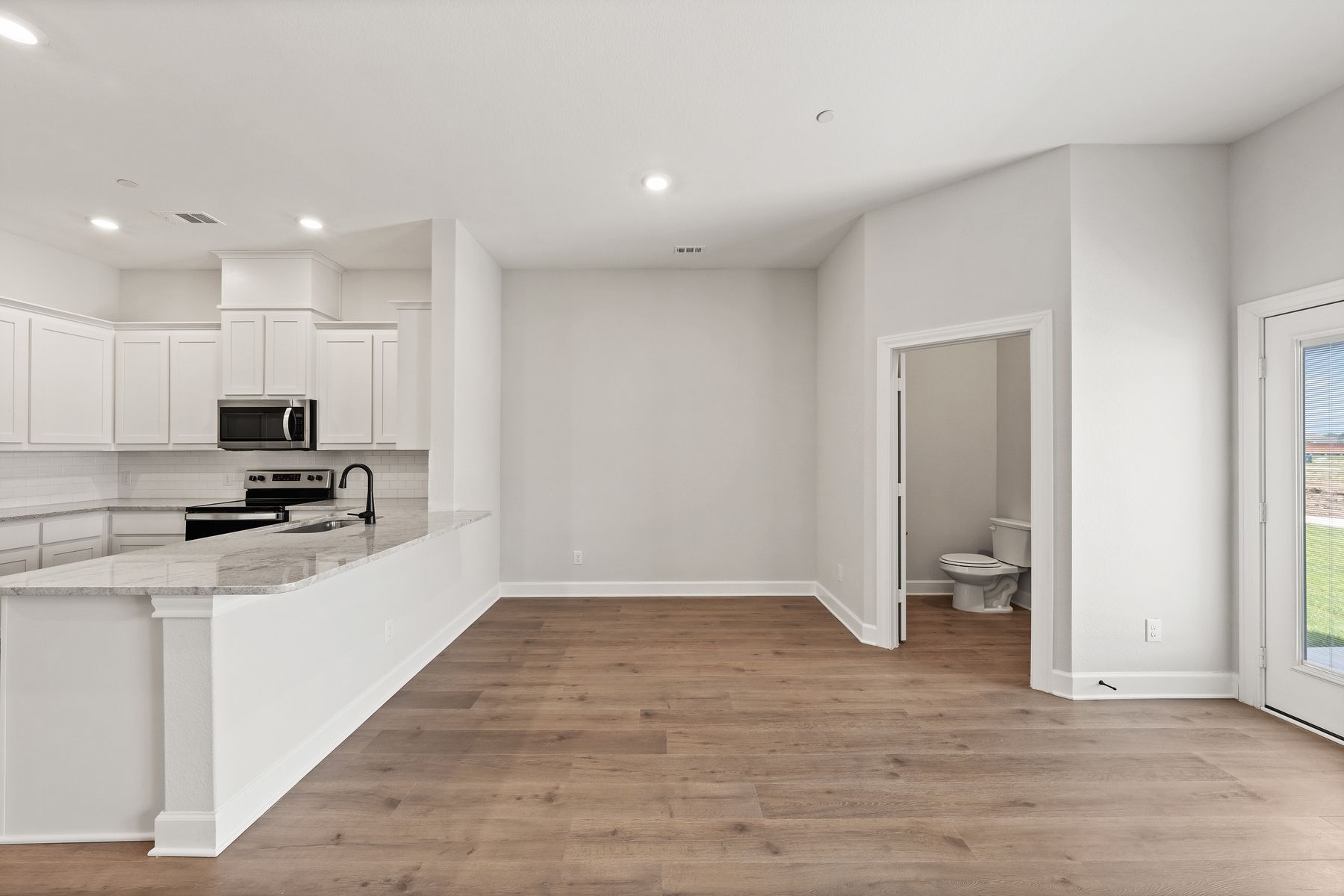 The dining area sits adjacent to the kitchen.