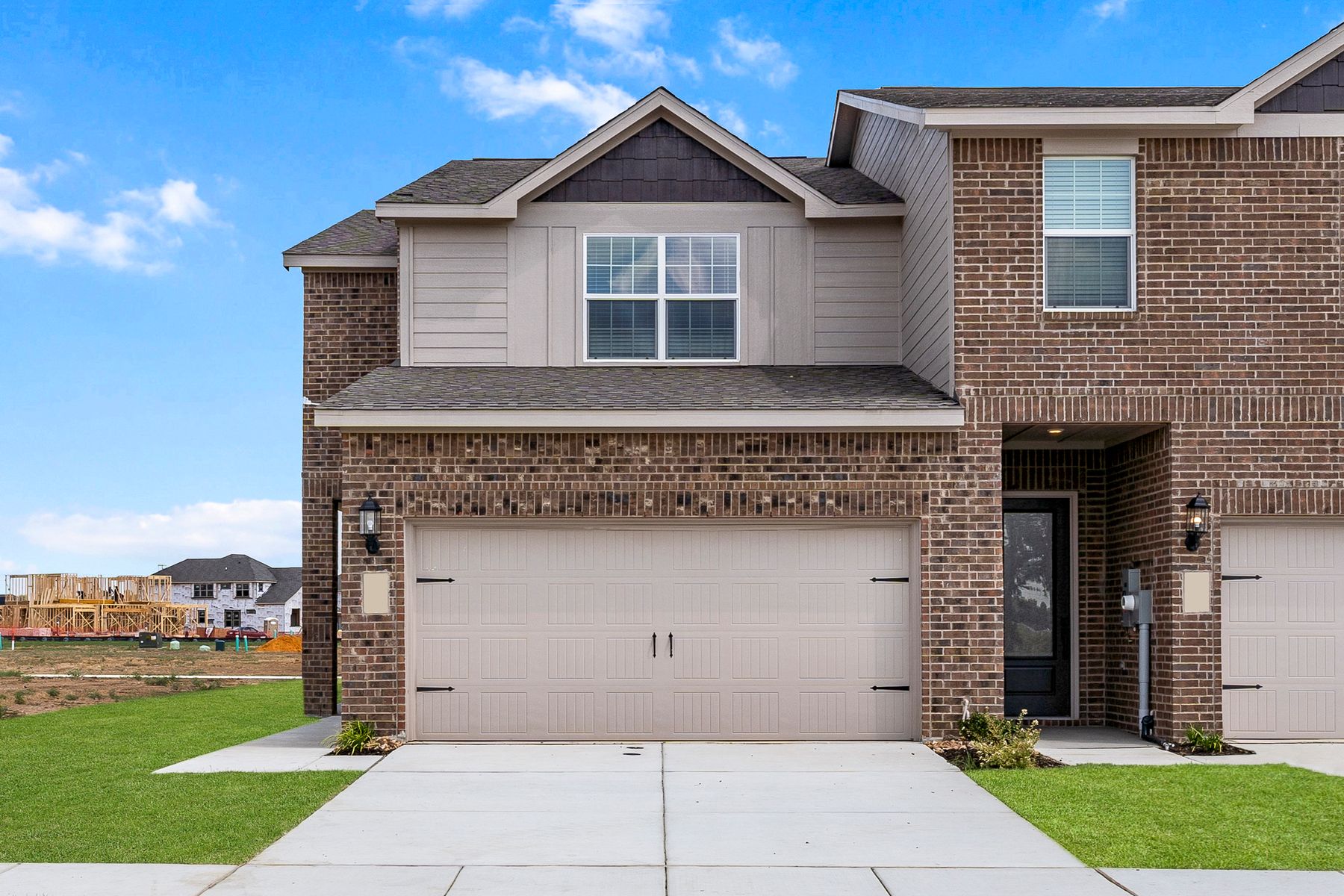 The Caspian is a beautful floor plan with brick and siding exterior.