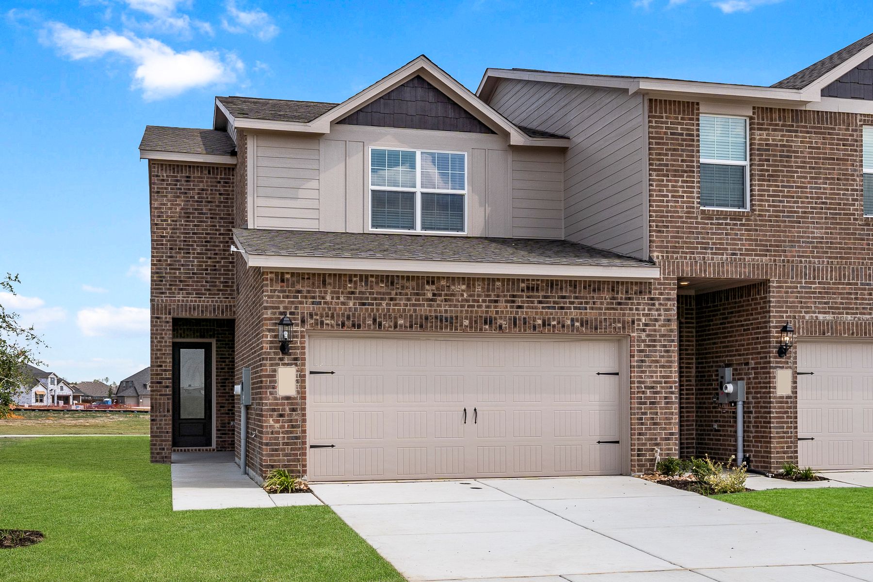 The Caspian is a beautful floor plan with brick and siding exterior.