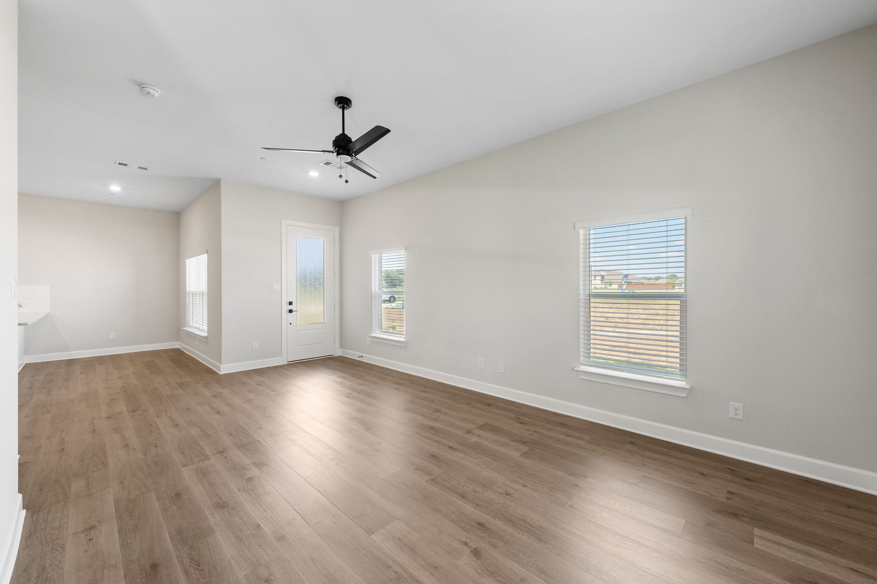 The first floor of the Caspian floor plan has large windows that let in great, natural light.