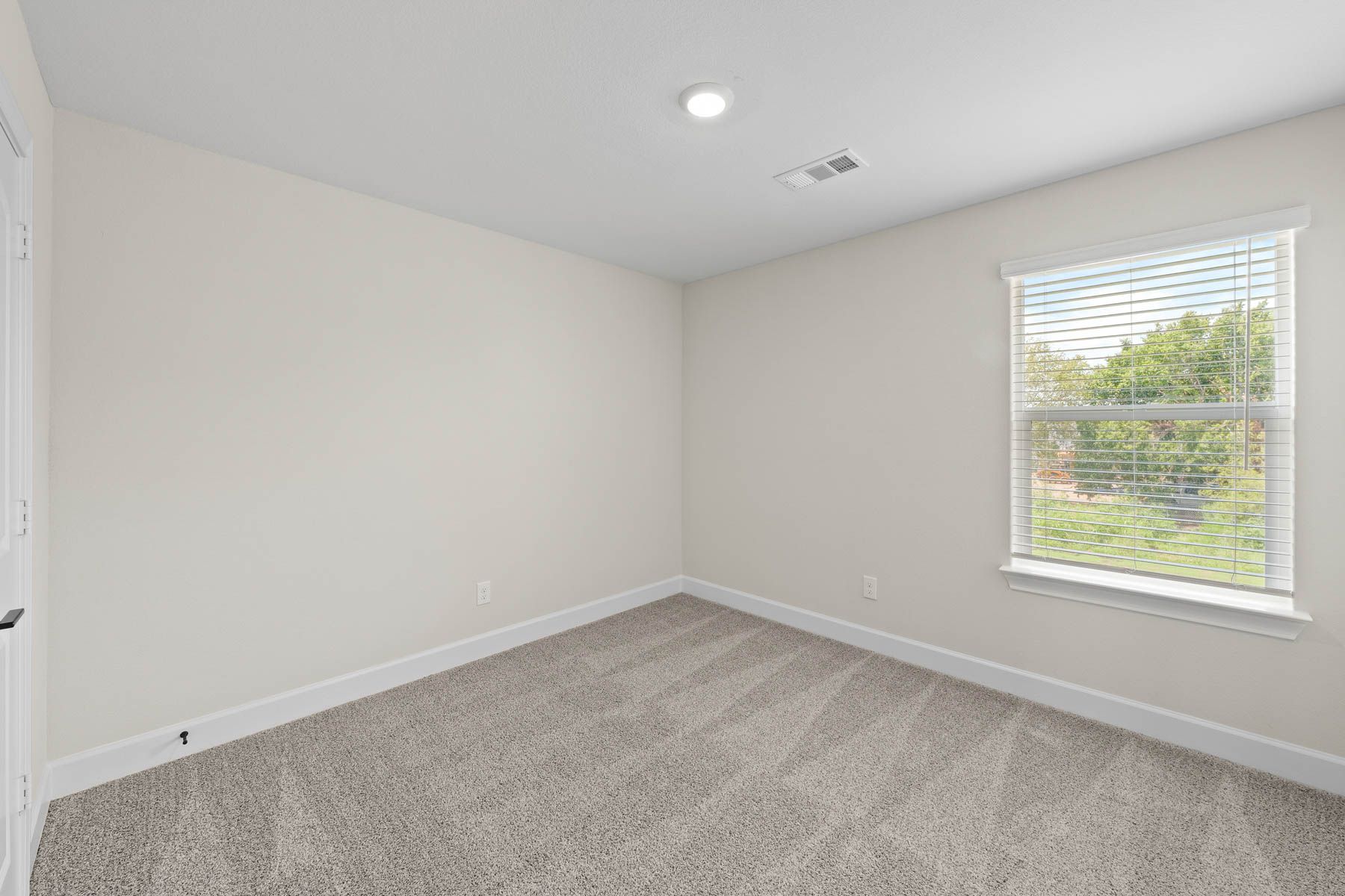 The secondary bedrooms of the Noma are the perfect space for a child's bedroom or a guest room.