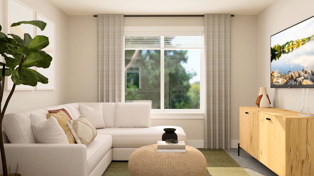 Rendering of the upstairs loft with a sectional couch. 
