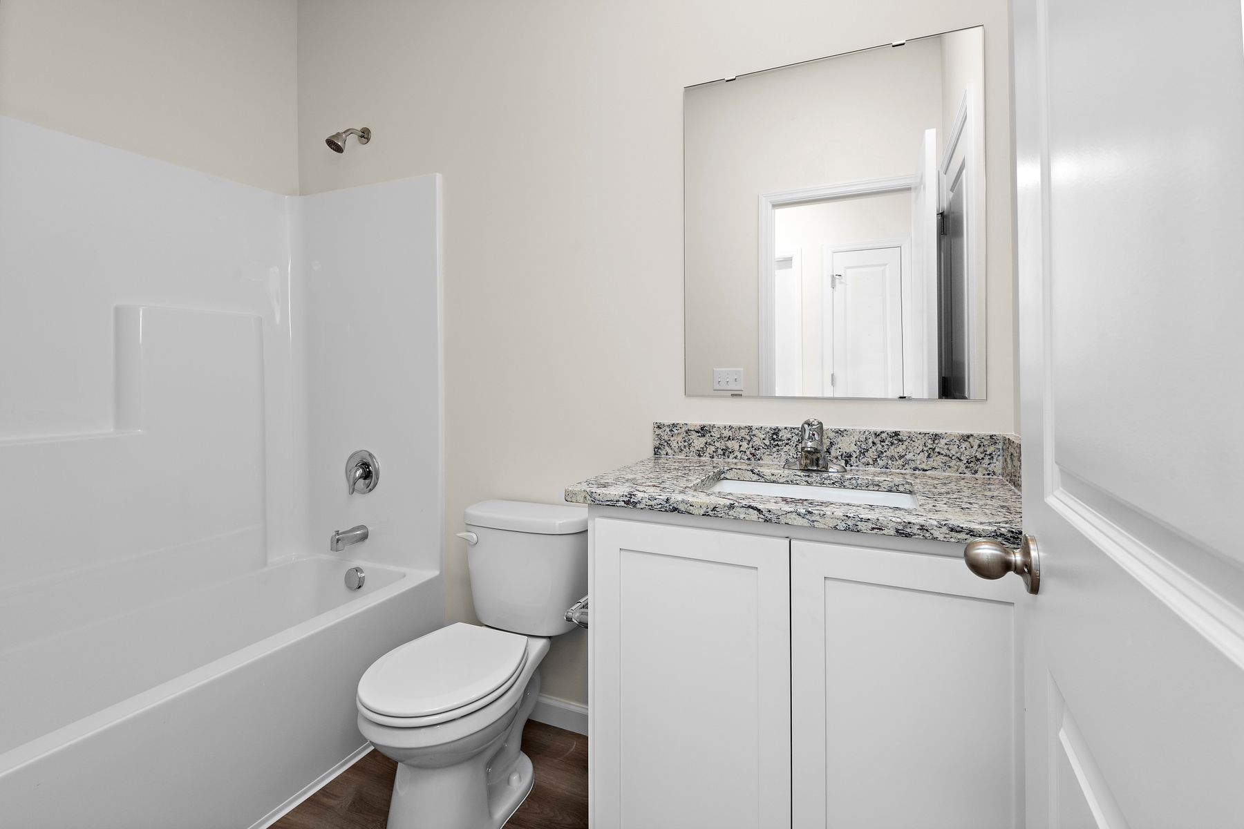 The bathrooms have tub/shower combos in them.