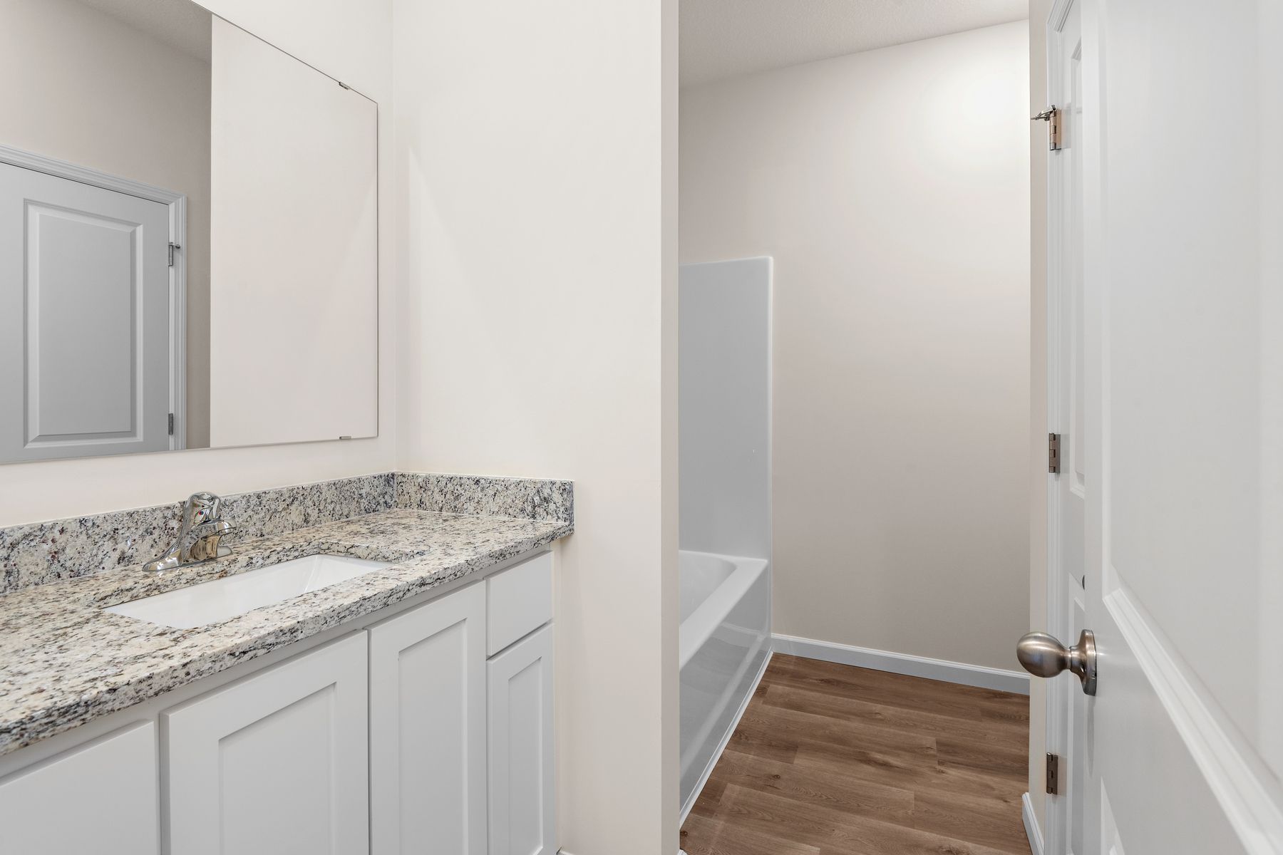 The secondary bathroom has the tub/shower combo.