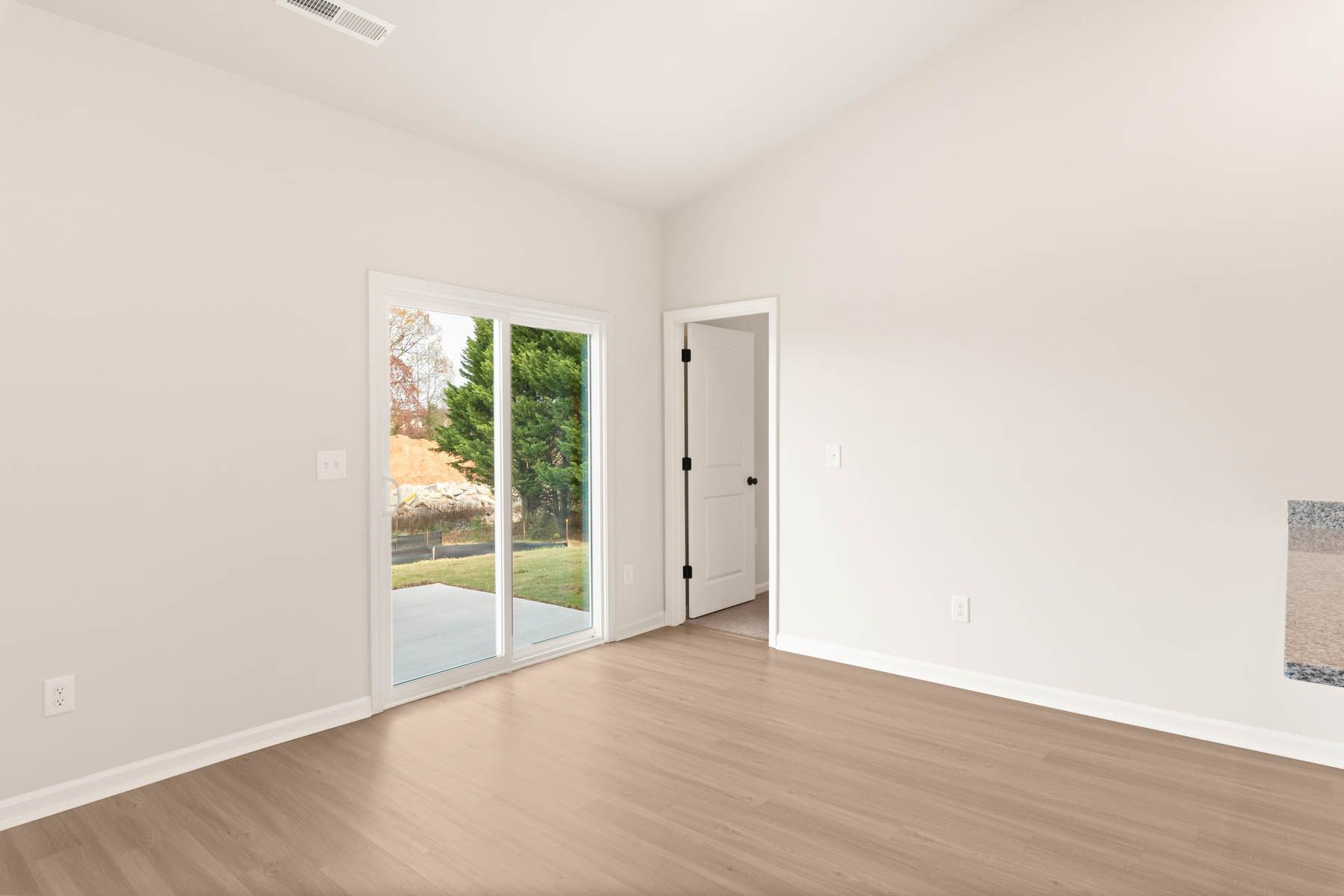 The master bedroom has enough space for your king-sized furniture.