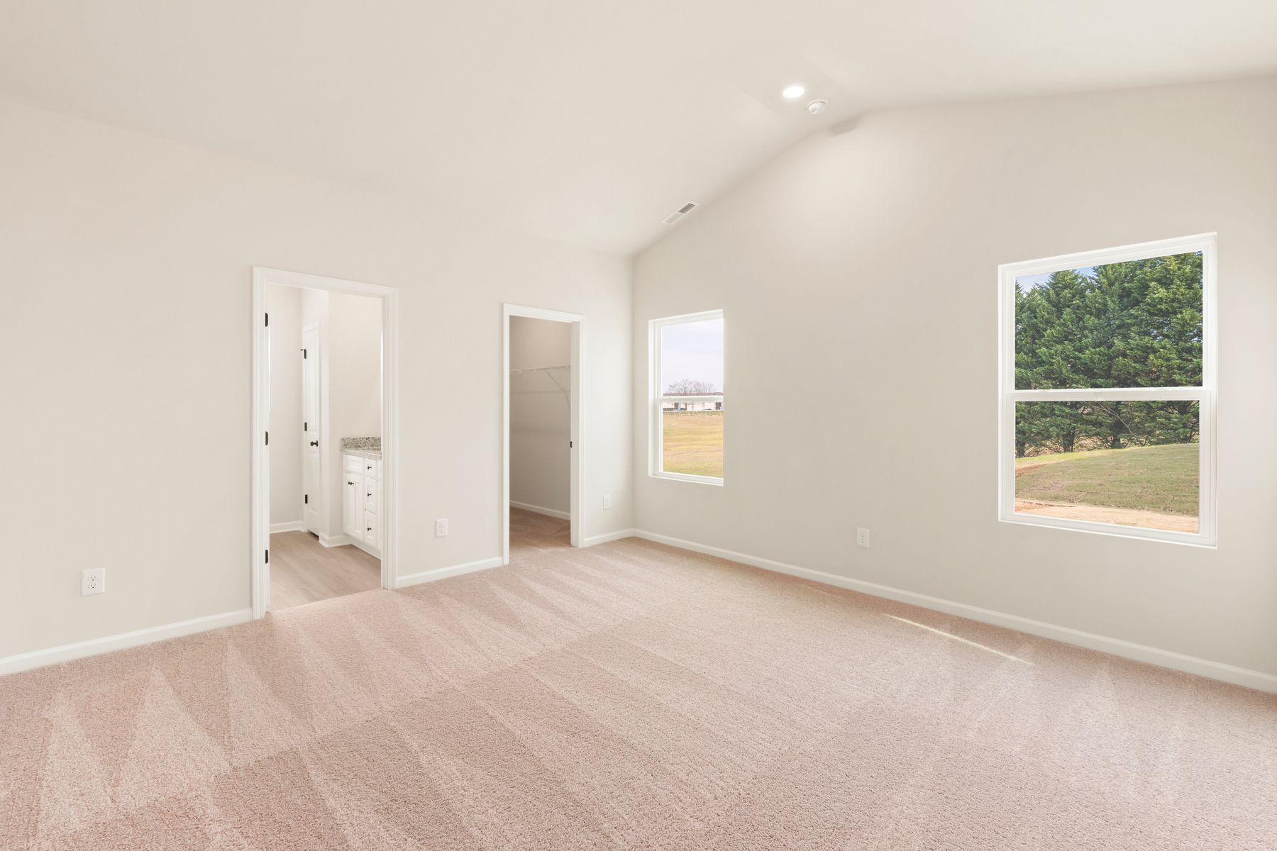 The master bedroom has enough space for your king-sized furniture.