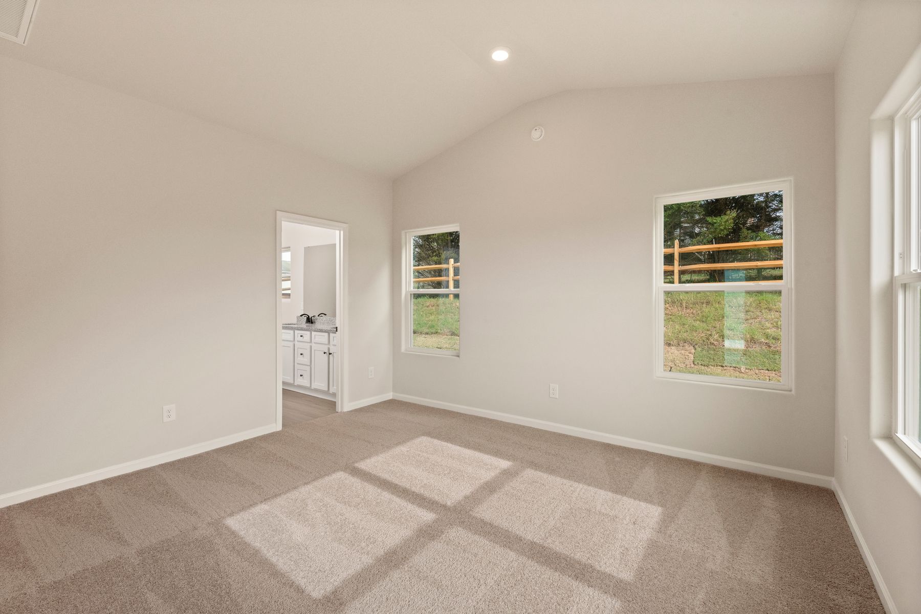 The master bedroom has enough space for your king-sized furniture.