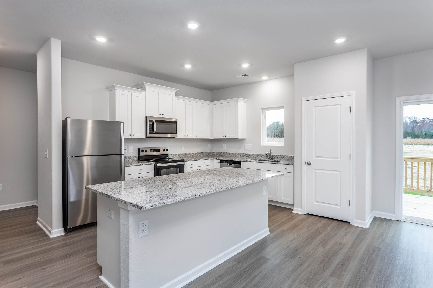 The kitchen comes with stainless-steel appliances