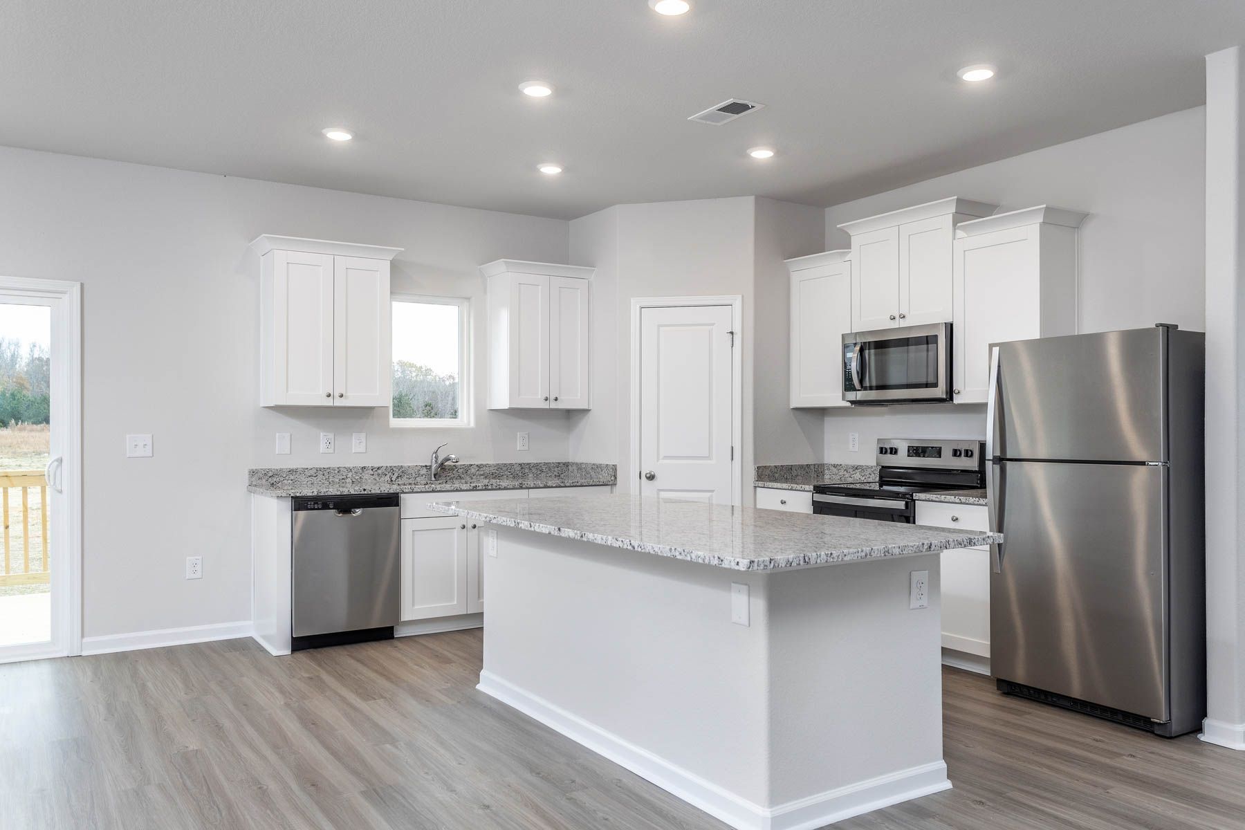 The living room opens to the kitchen