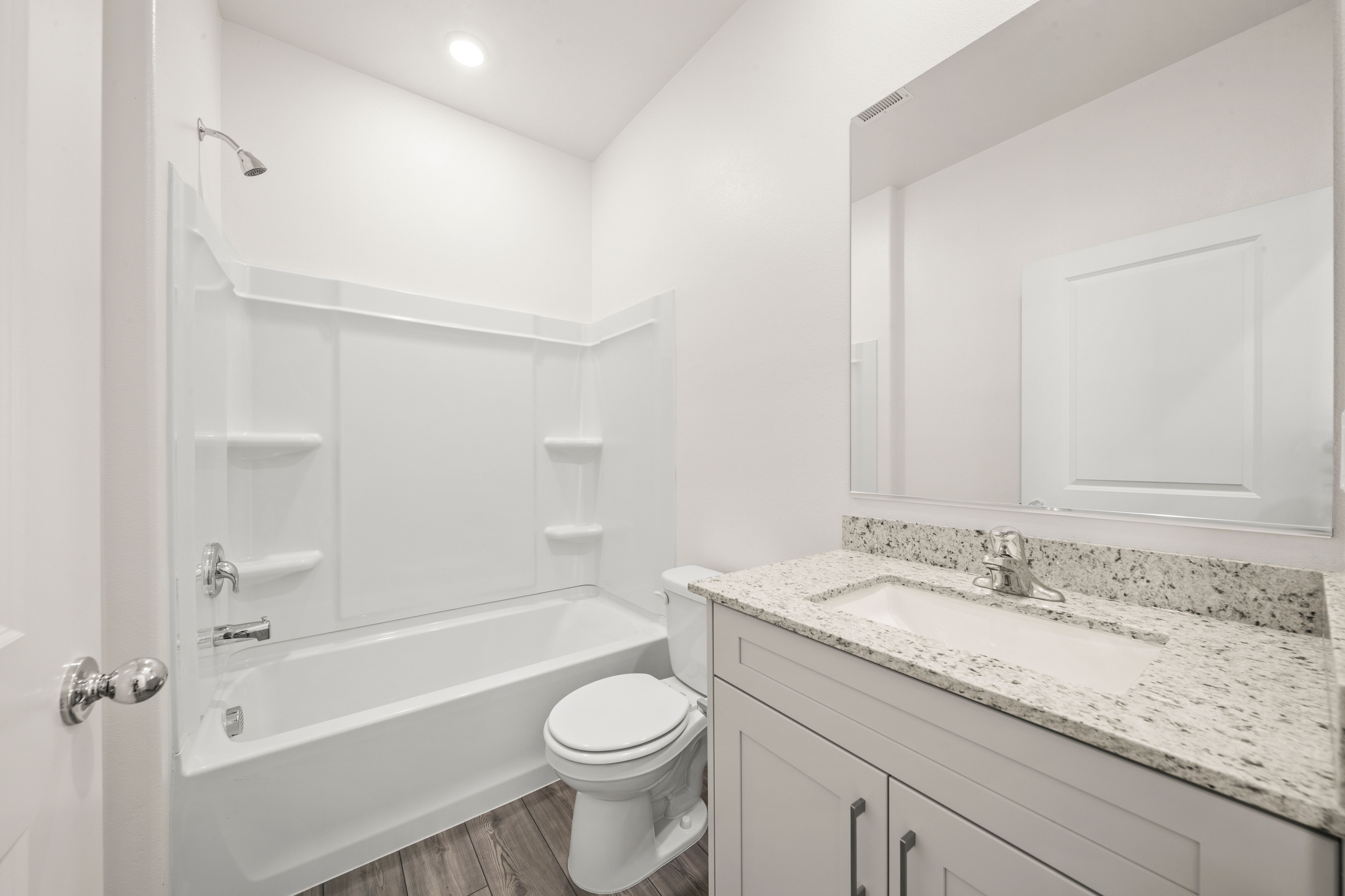The secondary bathroom has the tub/shower combo.