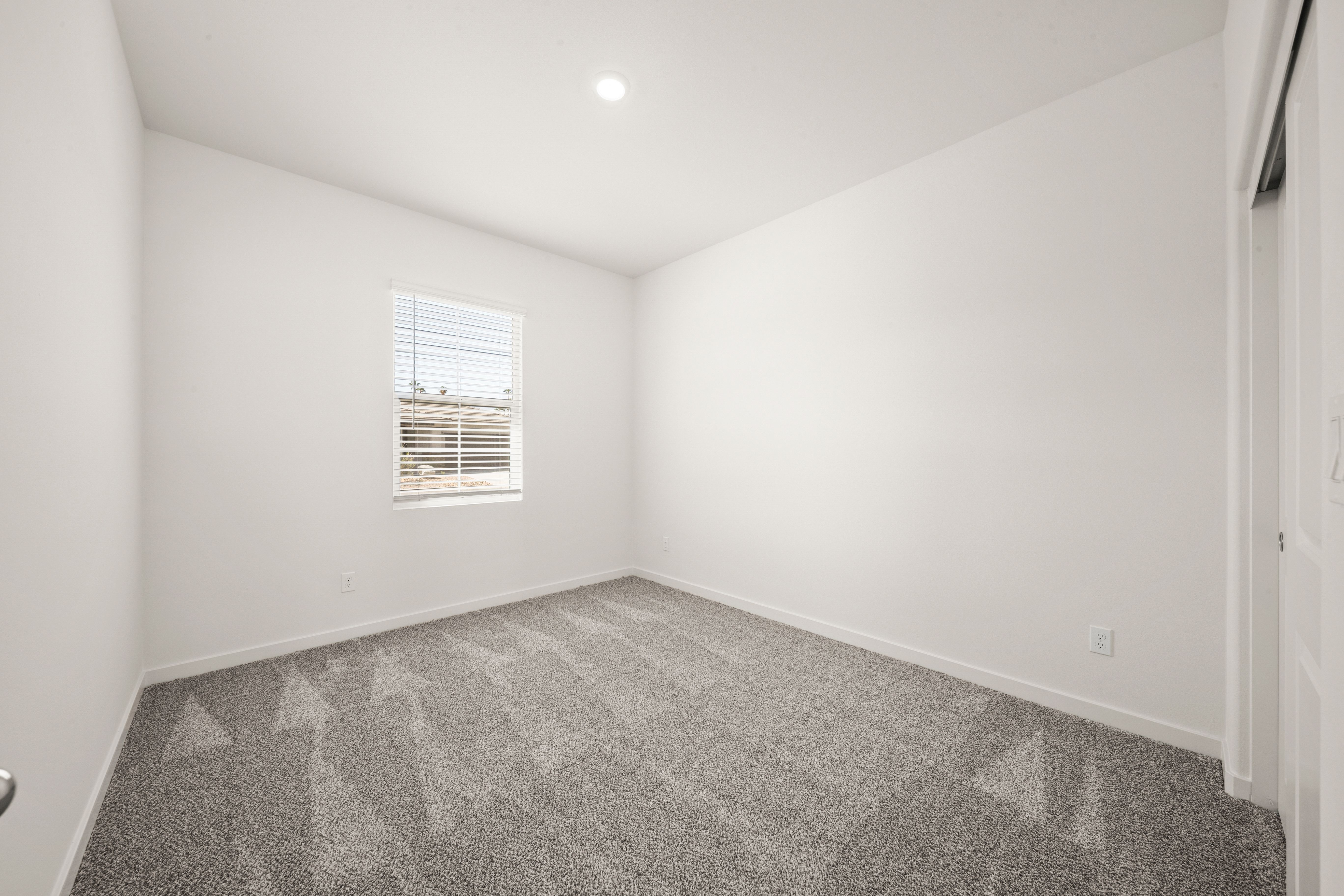 The secondary bedrooms have carpet.