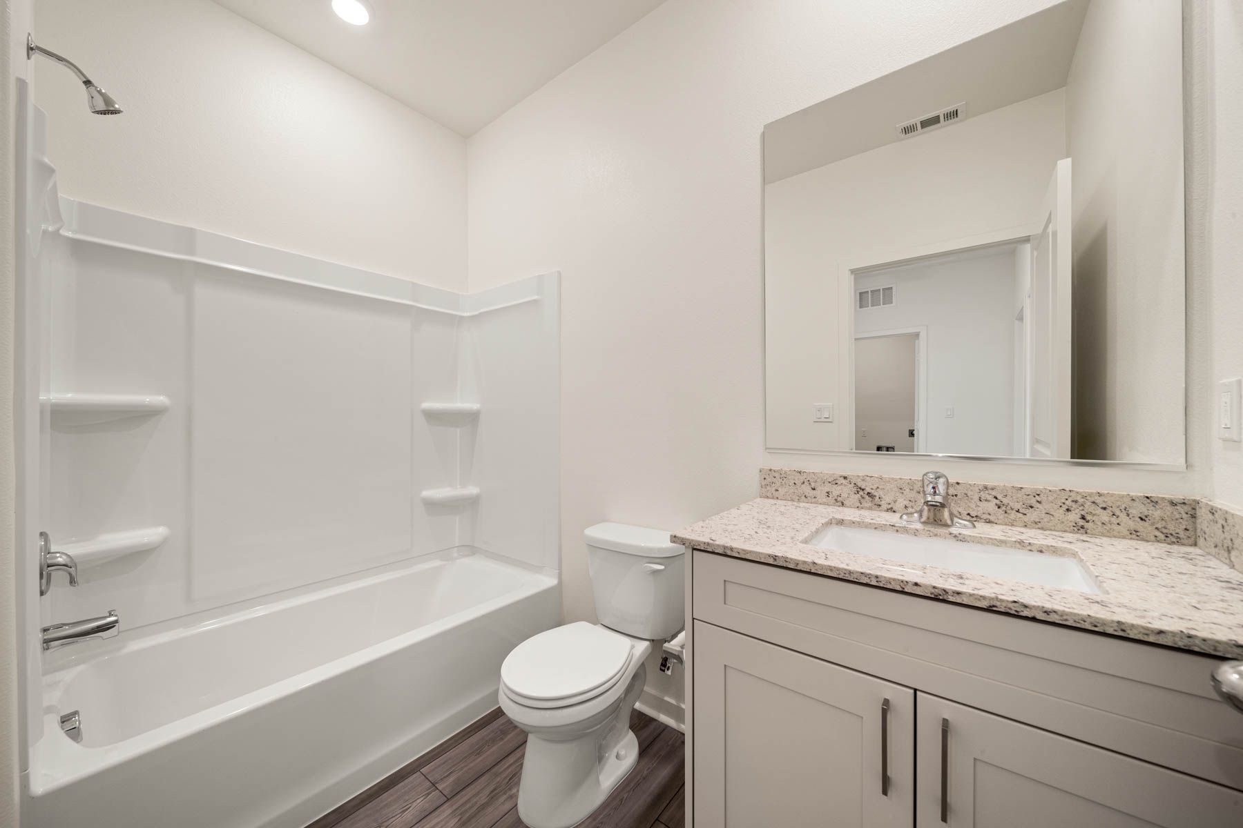 The secondary bathroom has the tub/shower combo.