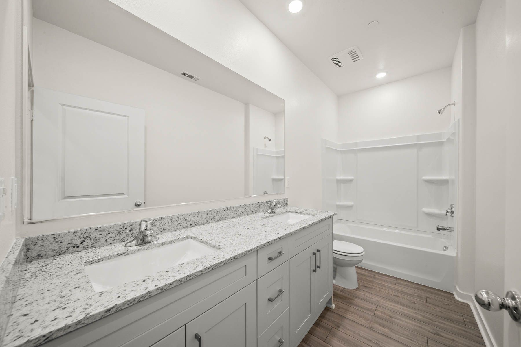 The secondary bathroom has the tub/shower combo.