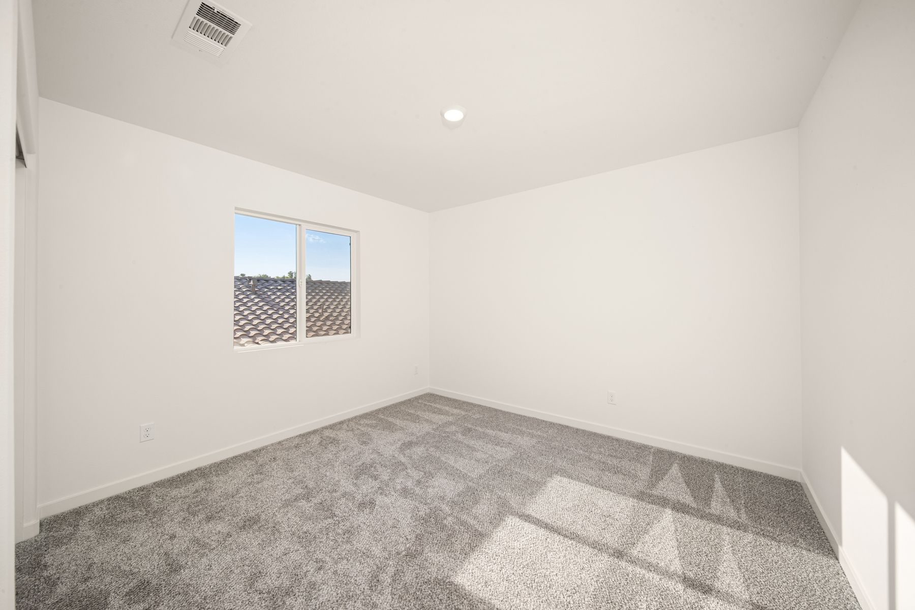 The secondary bedrooms have carpet.