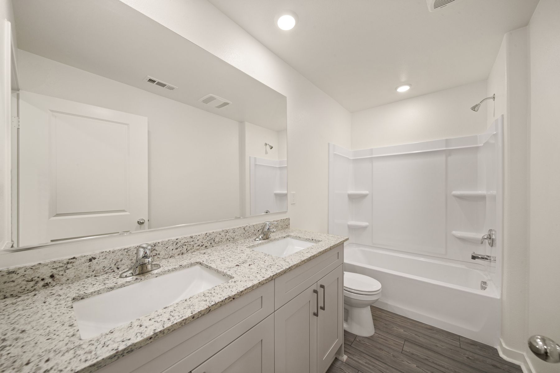 The secondary bathroom has the tub/shower combo.
