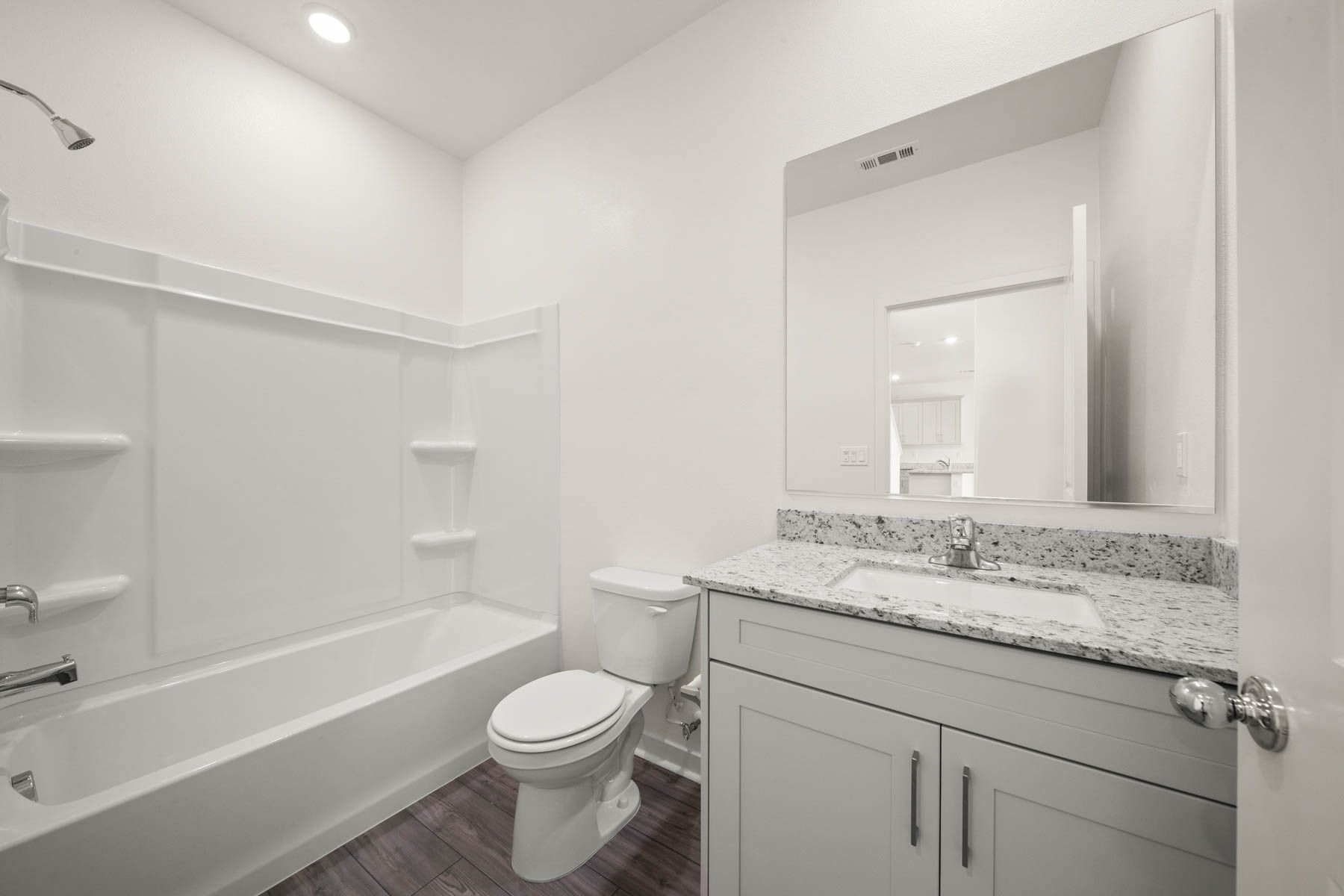 The secondary bathroom has the tub/shower combo.