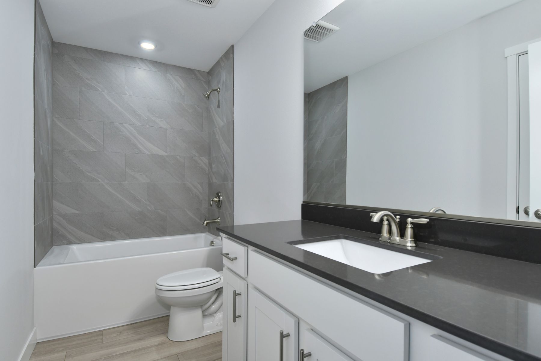 The secondary bathroom has the tub/shower combo.