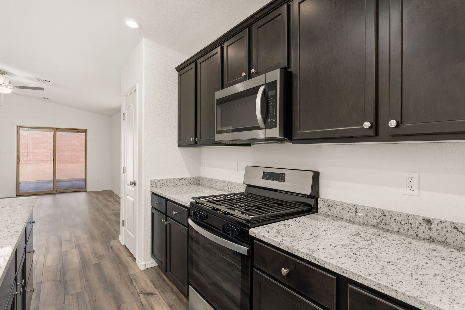 The kitchen comes with stainless-steel appliances.