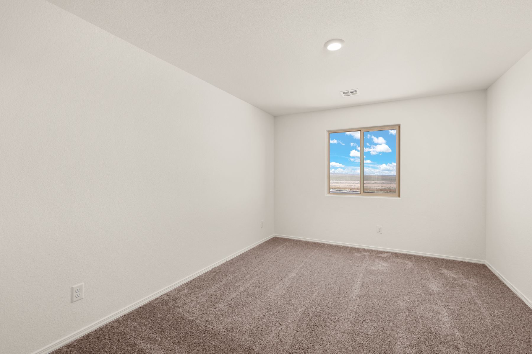 Each bedroom has a window letting in lots of light.