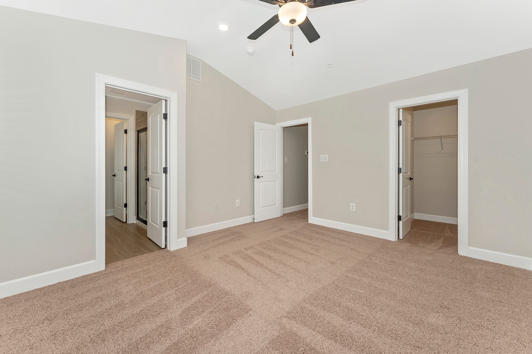 The master bedroom has enough space for your king-sized furniture.