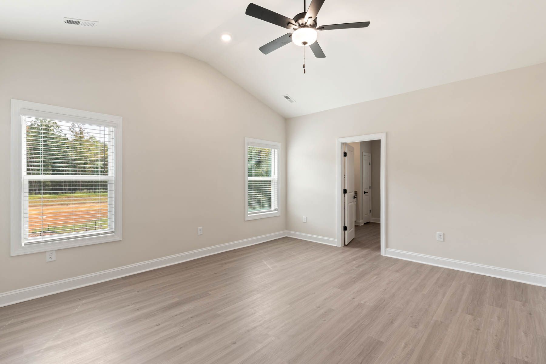 The master bedroom has enough space for your king-sized furniture.