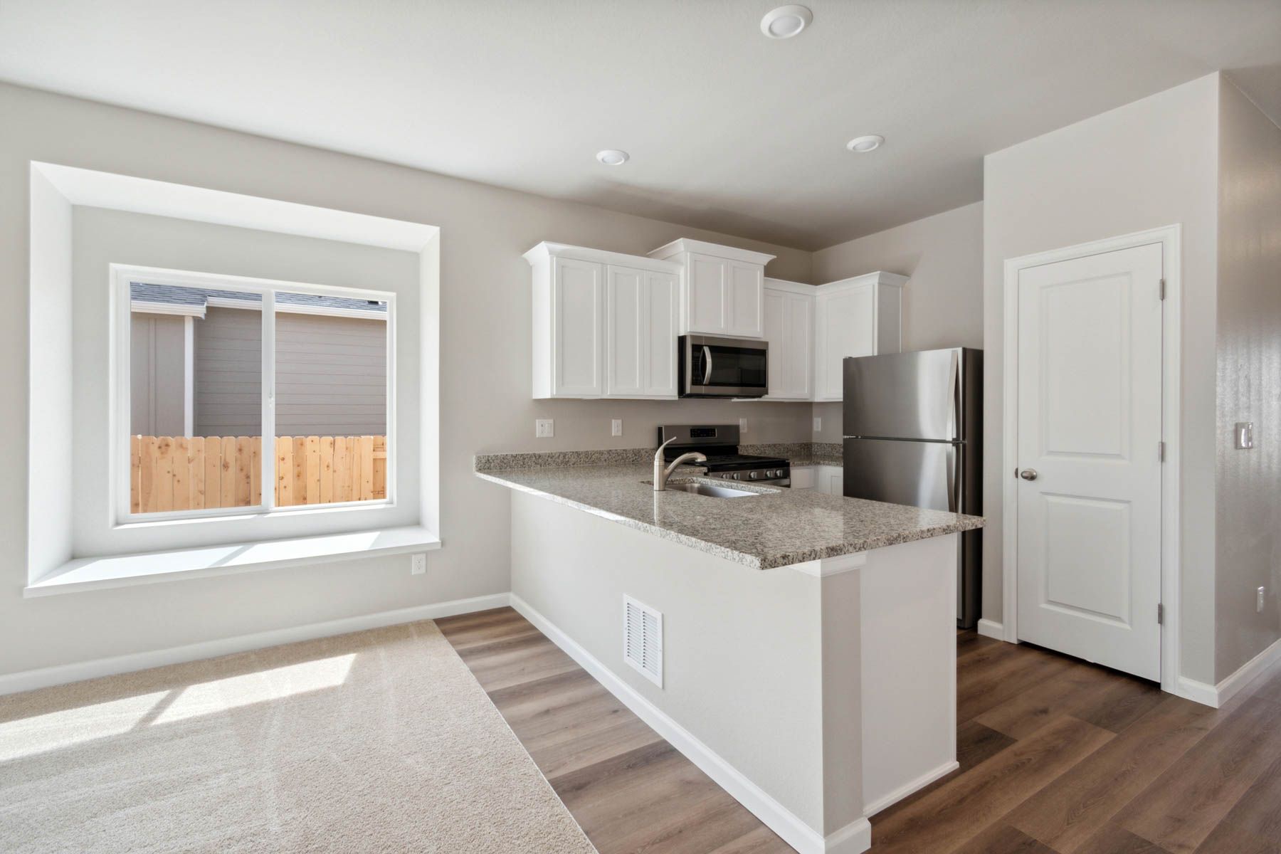 The kitchen appliances come included in this home.