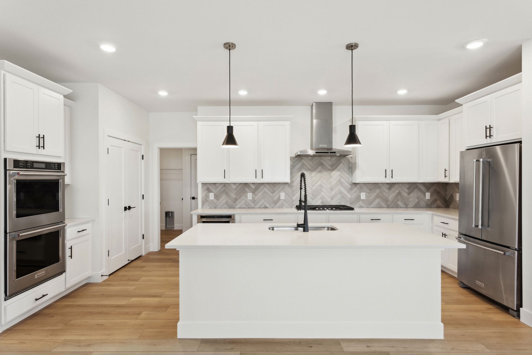 The kitchen has a wonderful island with quartz countertops.
