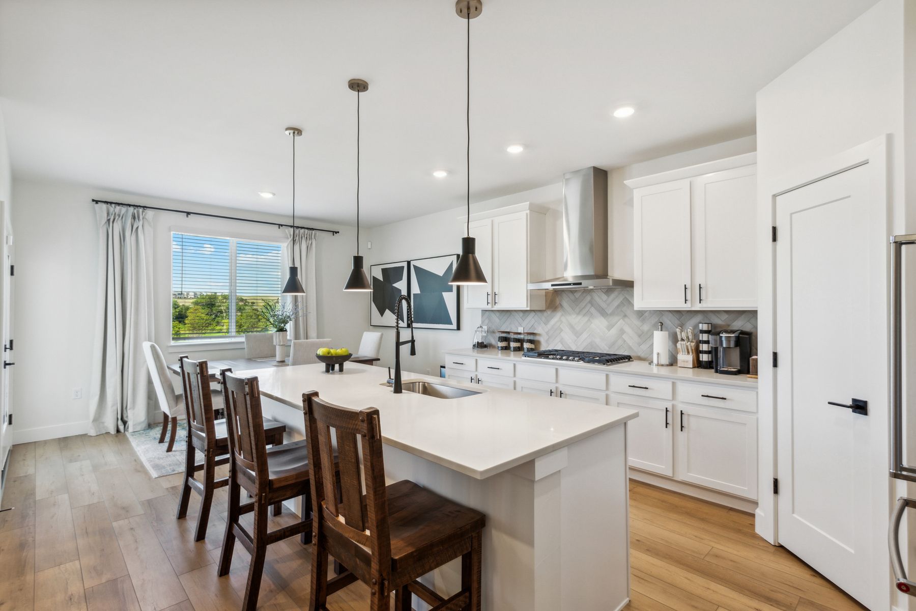 The dining room sits right off of the kitchen for convinent access.