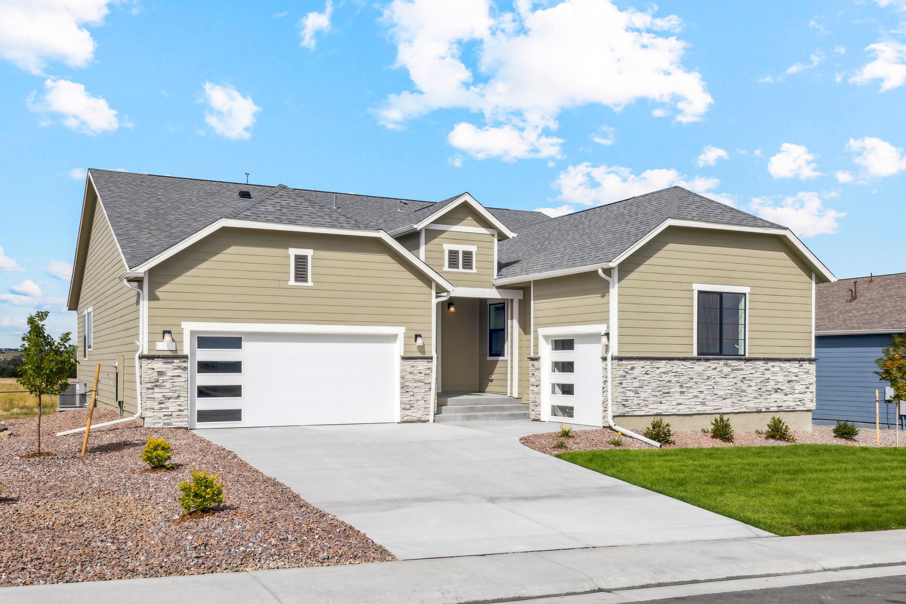 The Estes is a beautiful one-story home with a front-load, two-car garage.