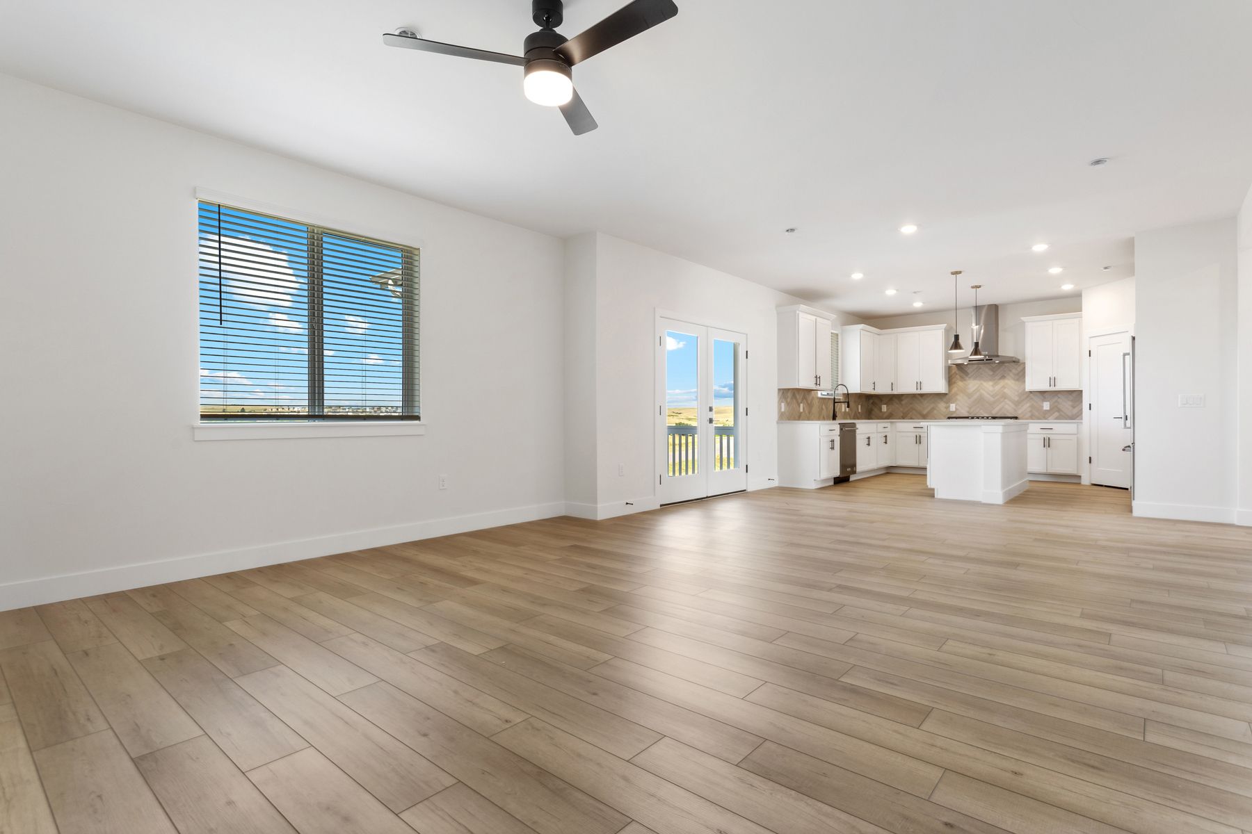 The open layout connects the living room dining area and kitchen.