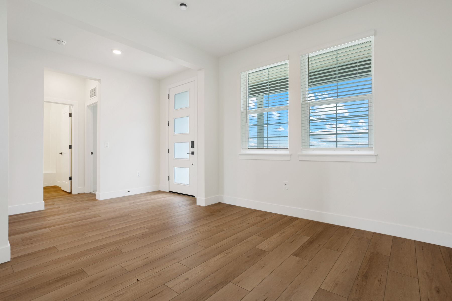 The dining room has two large windows that let in great, natural light.