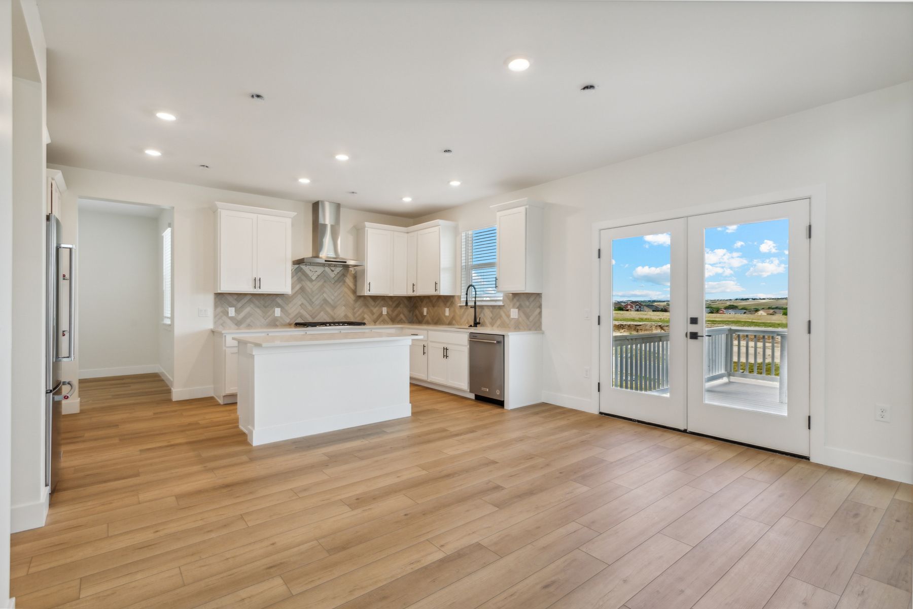 The kitchen and breakfast area have large windows that let in great, natural light.