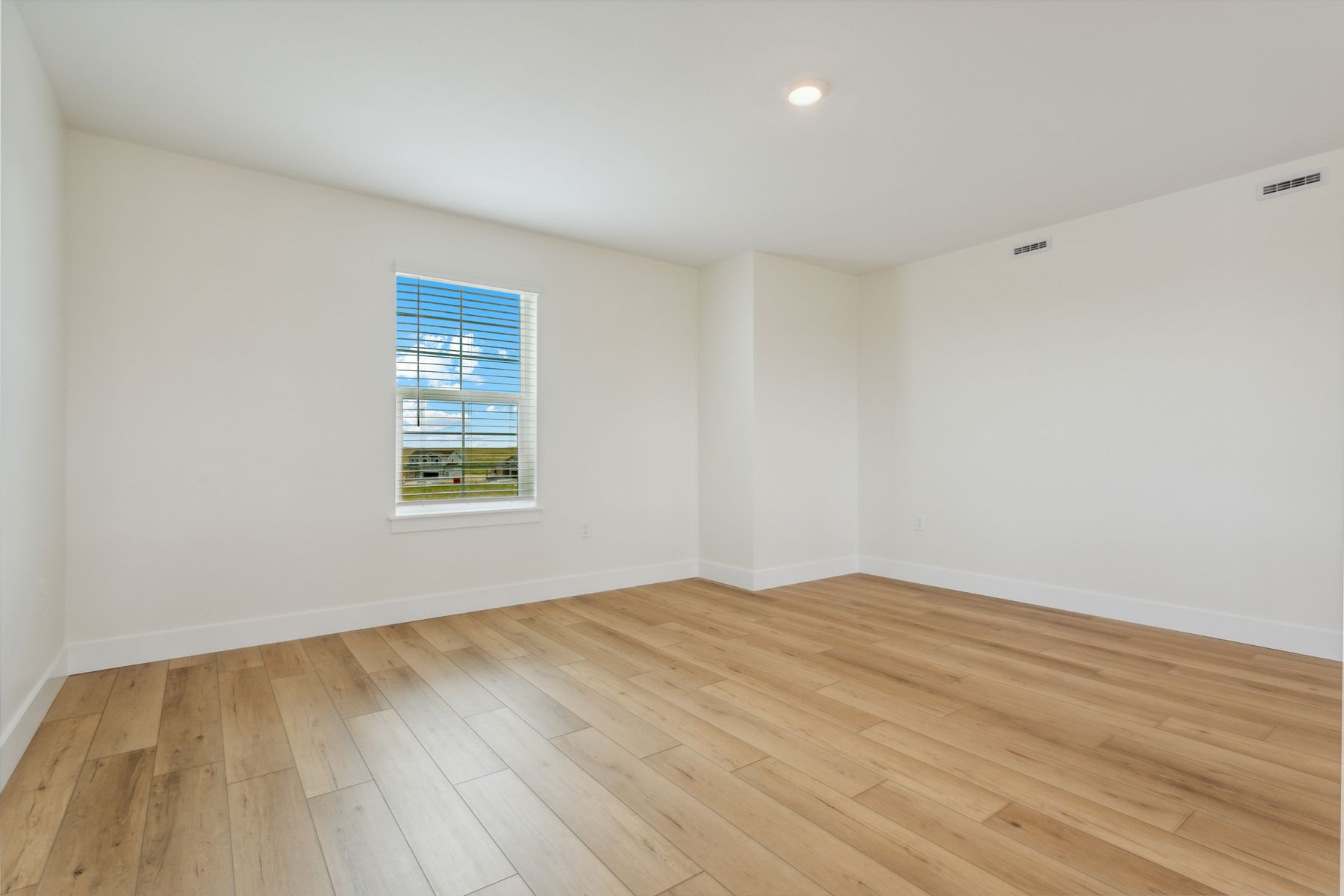 The upstairs loft is a versatile space that can easily be transformed to fit any family's needs.