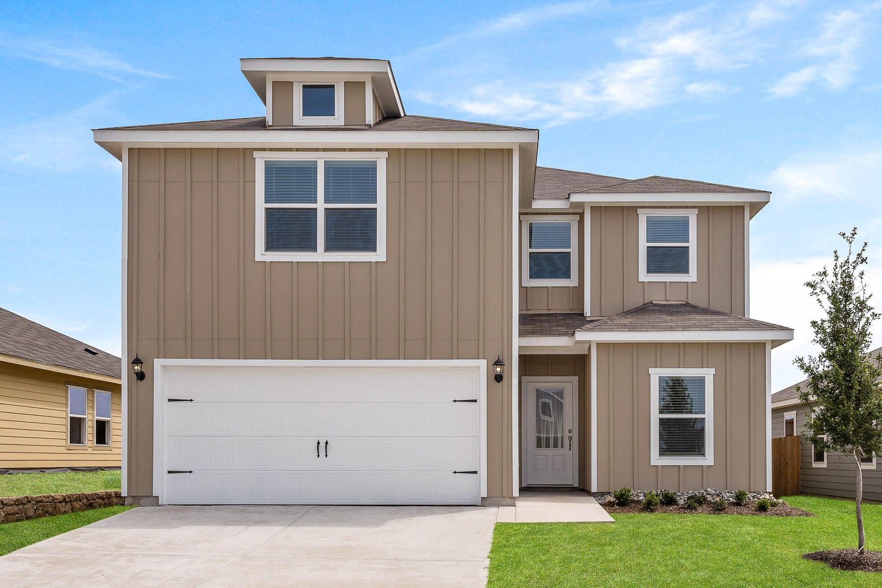 Exterior photo of the beautiful, two-story Driftwood plan.