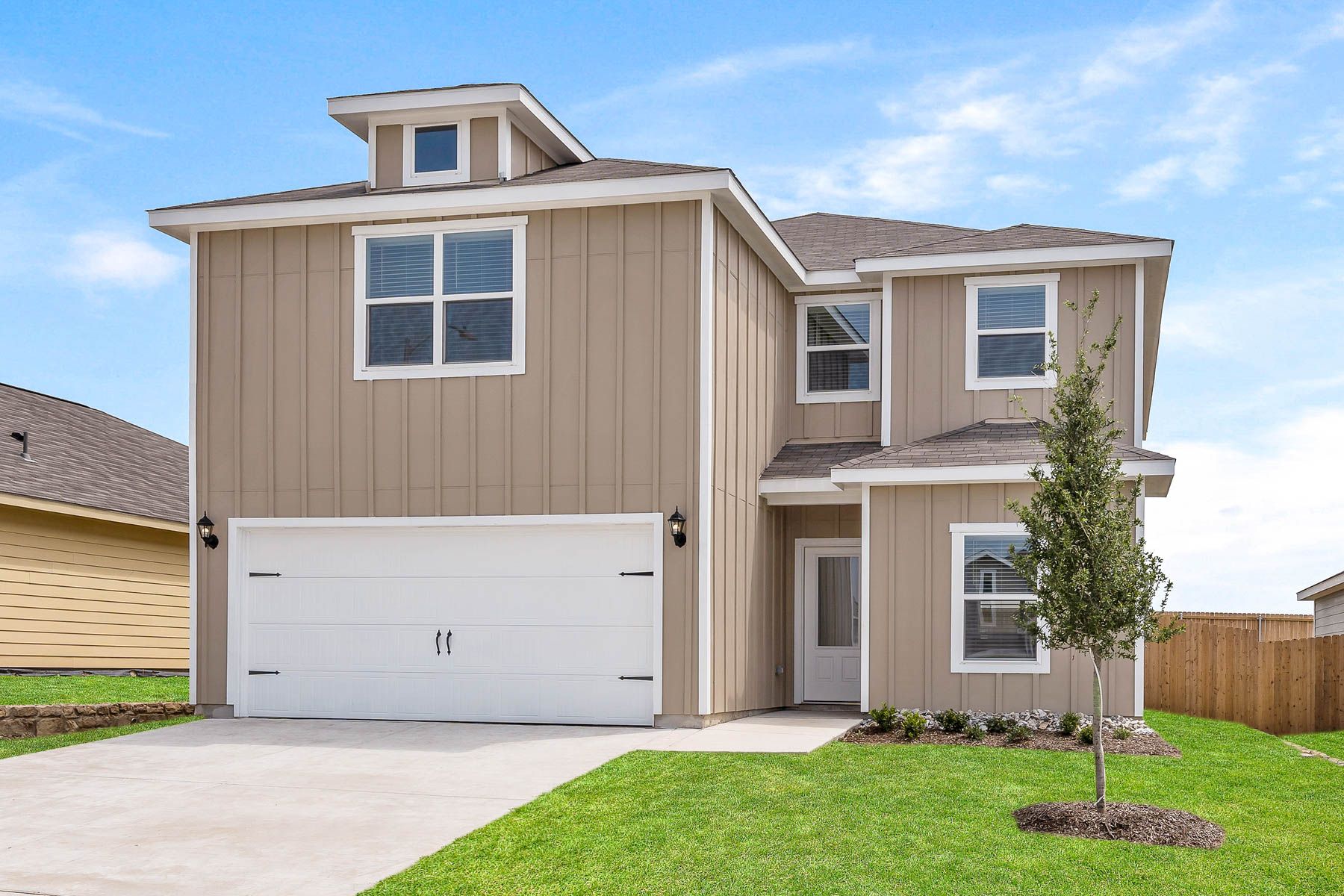 Exterior photo of the beautiful, two-story Driftwood plan.