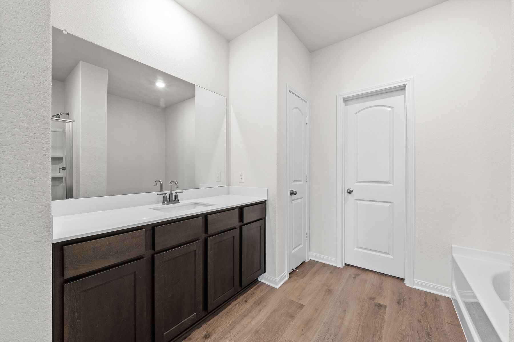 The master bathroom of the Cypress has a large vanity space.