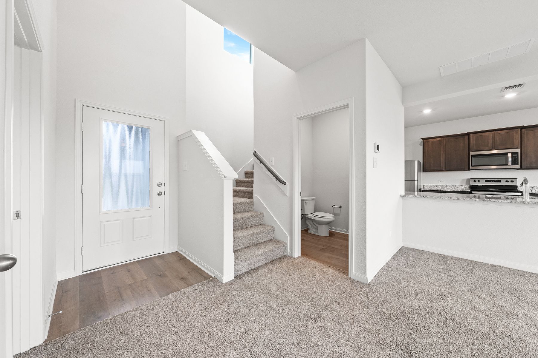 The first story of the Cypress floor plan has a powder room.