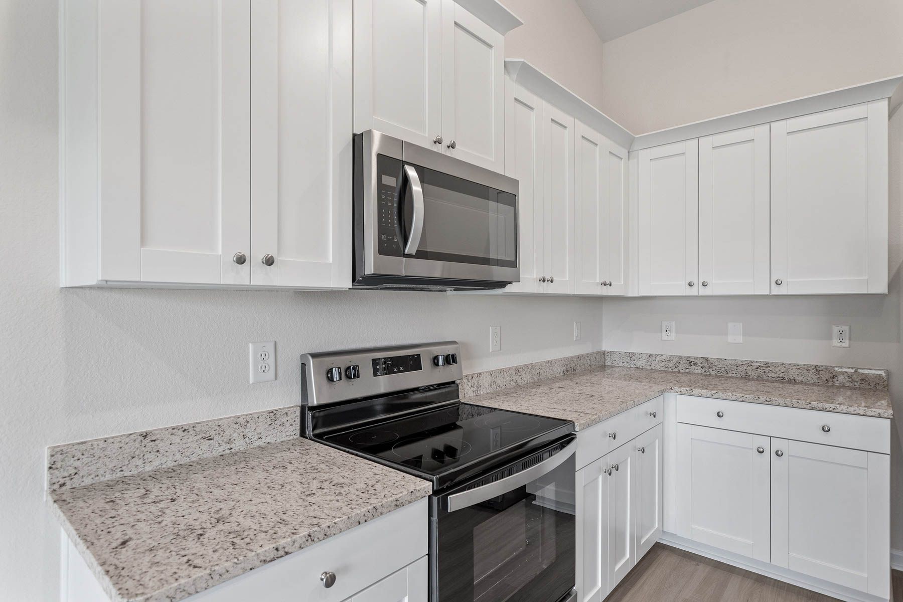 The kitchen has granite countertops