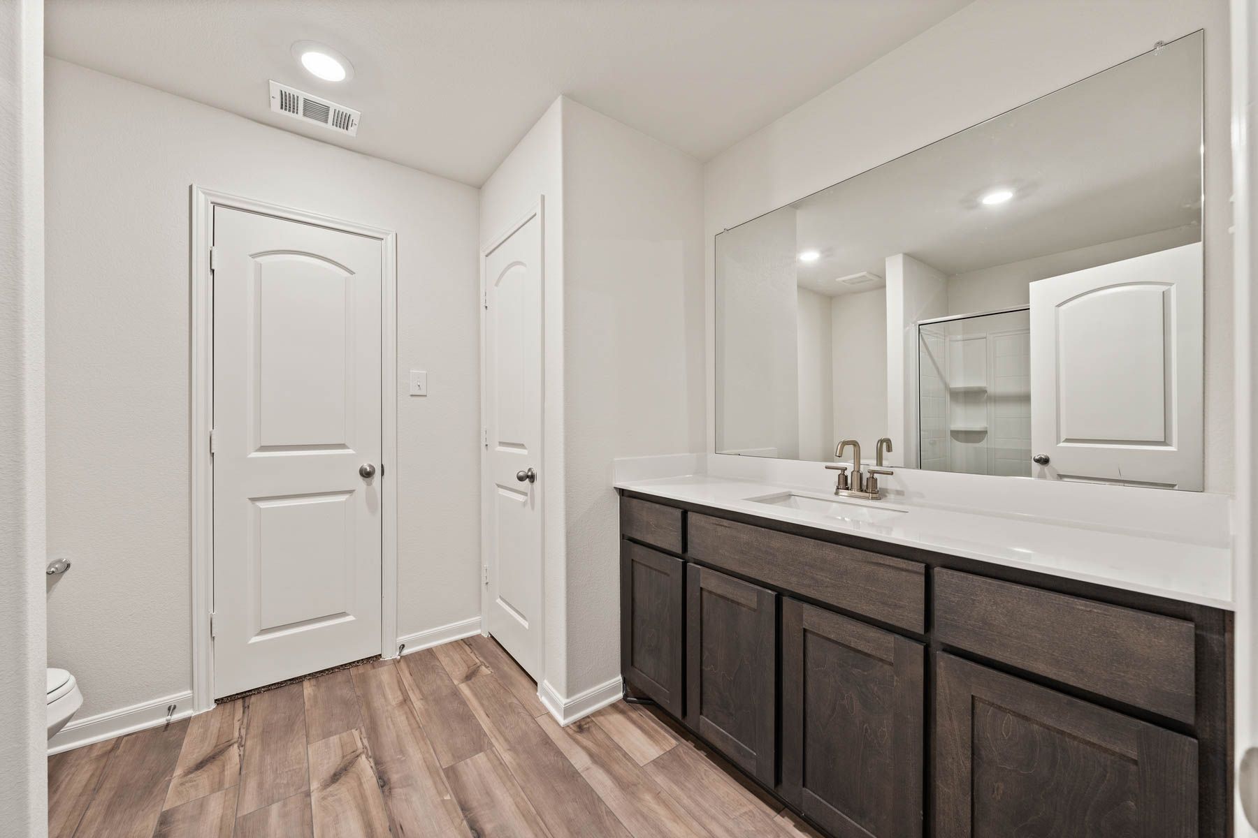 The private master bathroom of the Rio Grande has plenty of vanity space.