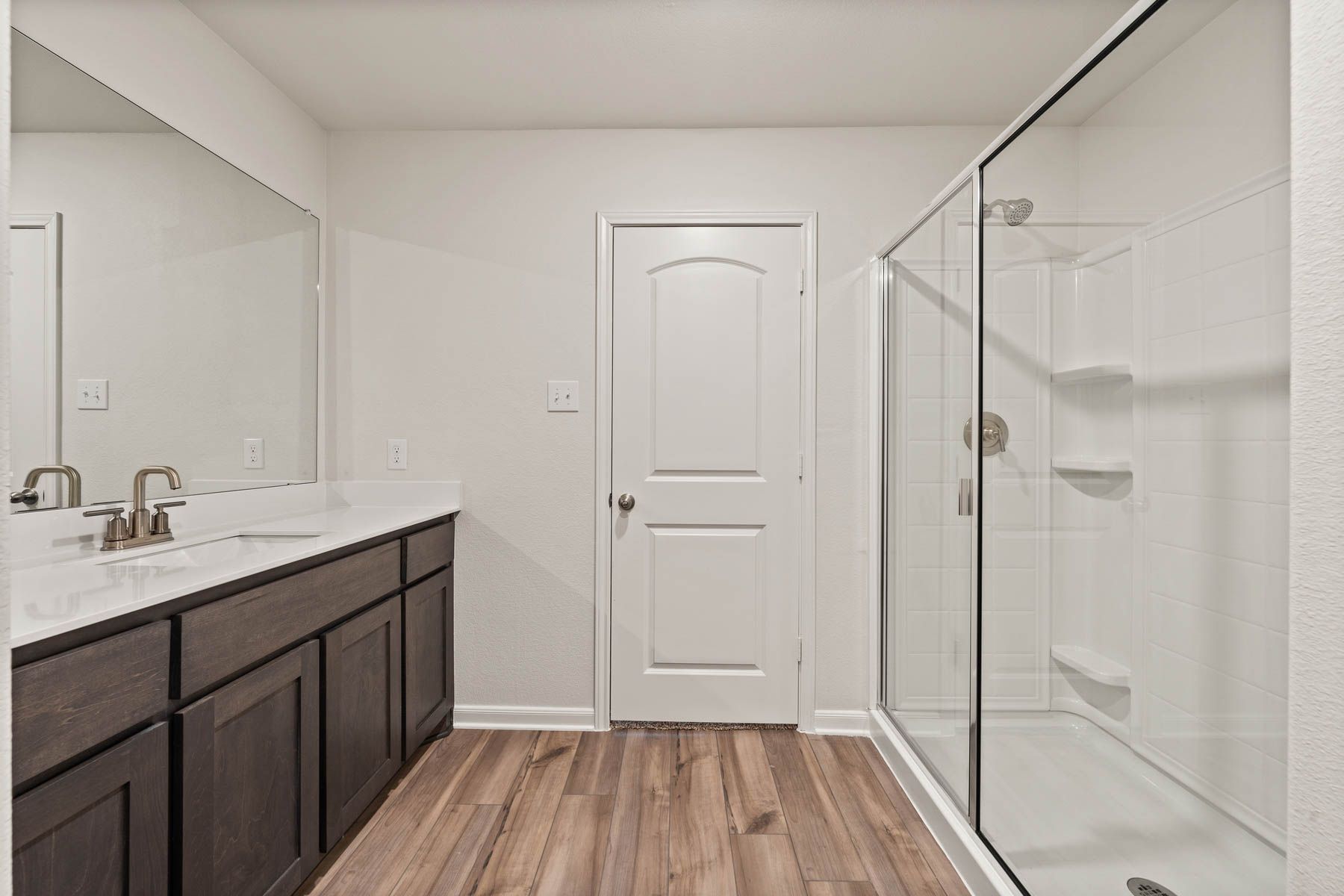 The master bathroom of the Rio Grande includes a large, walk-in, glass shower.