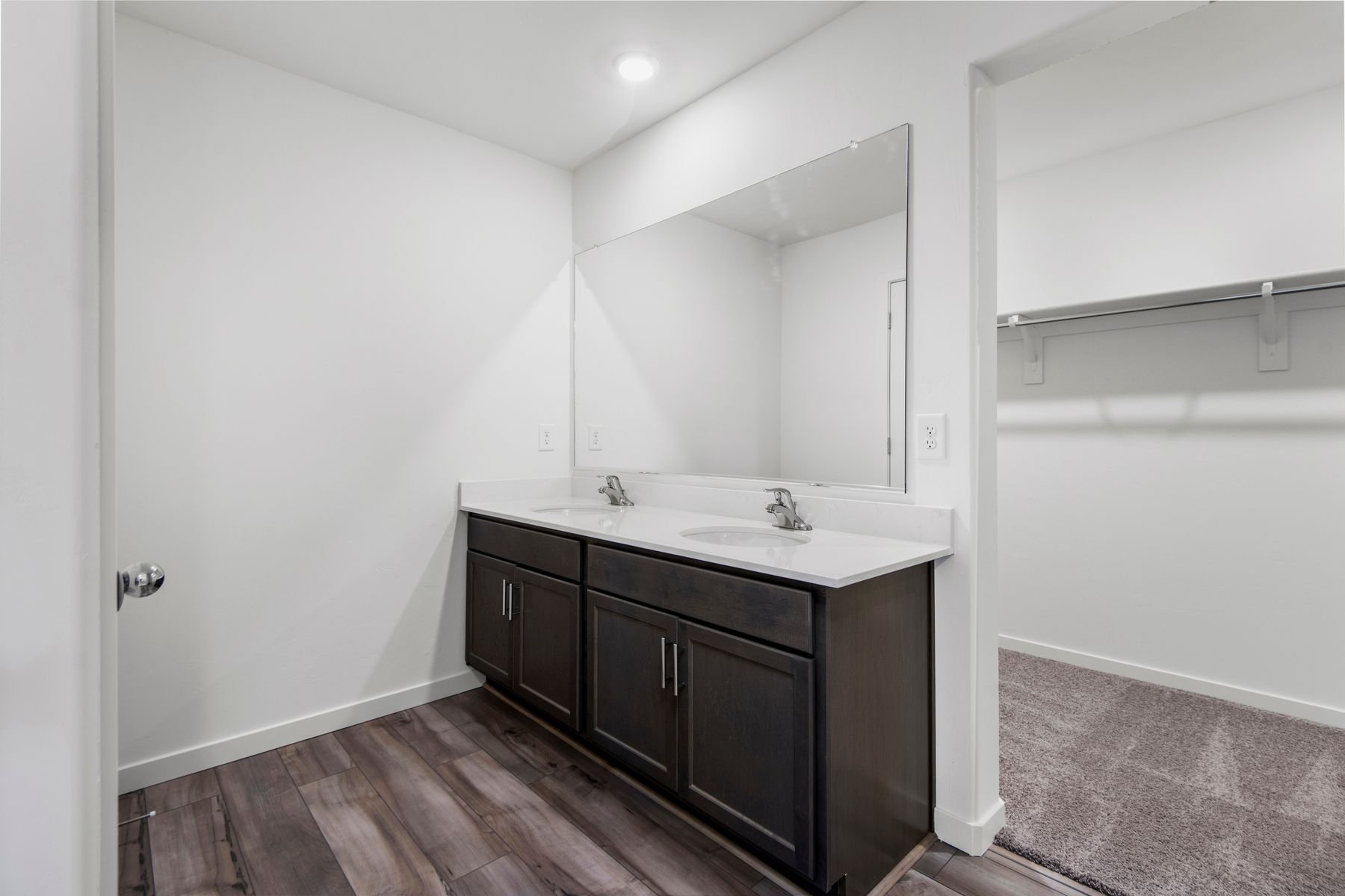 The master bathroom is filled with space for getting ready.