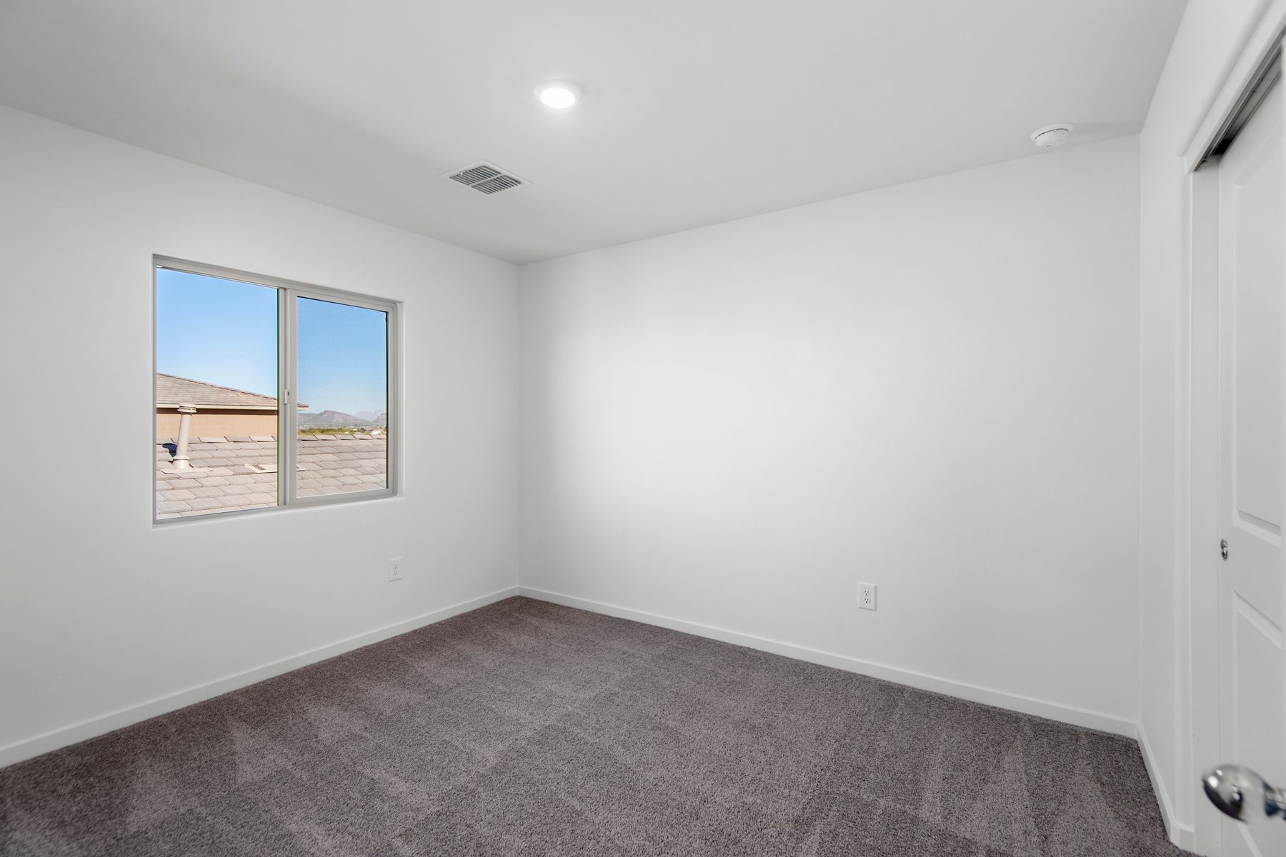 Secondary bedrooms have natural light to open up the space.