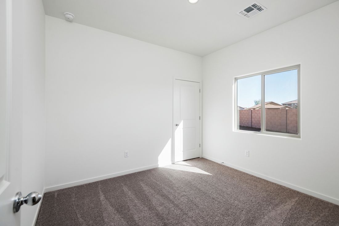 The guest bedrooms each come with natural lighting and closet space for guests to enjoy.