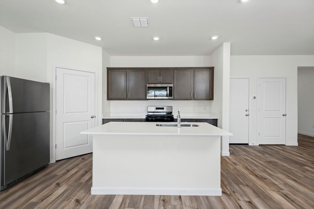 The kitchen has tons of countertop space for cooking all the meals for family and friends!