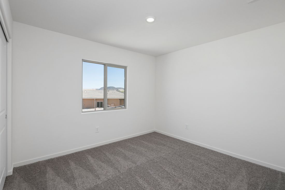 The secondary bedrooms are the perfect place for guests to relax.