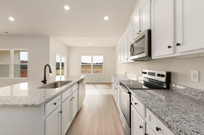 The kitchen has granite countertops